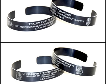 Laser engraved memorial bracelets for Jim Porter and Christopher Norman.