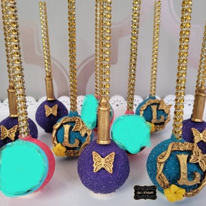 LaFamilia Mirabel inspired themed cakepops. Isabella inspired cakepop. Mirabe inspired themed party. Anto party favors. La Familia cakepop