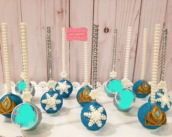 Snowflake froze inspired themed cakepops. Snowflake cakepop. Frozen inspired party. Frozen party favors. Princess Snowflake frozen party