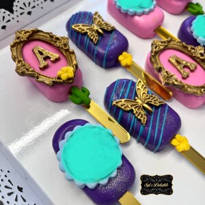 Enchanted cakesicles. Mirabel cookies. Mirabel cakepops. Mirabel cakesicles.  Isabella cookies. Isabella cakepops