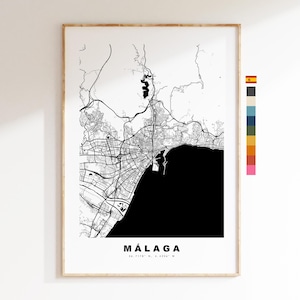 May include: Black and white map print of Malaga, Spain. The map shows the city's streets and coastline. The city name is printed in white at the bottom of the map.