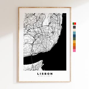 May include: Black and white map print of Lisbon, Portugal with the city name and coordinates at the bottom. The map shows the city's streets and the Tagus River.
