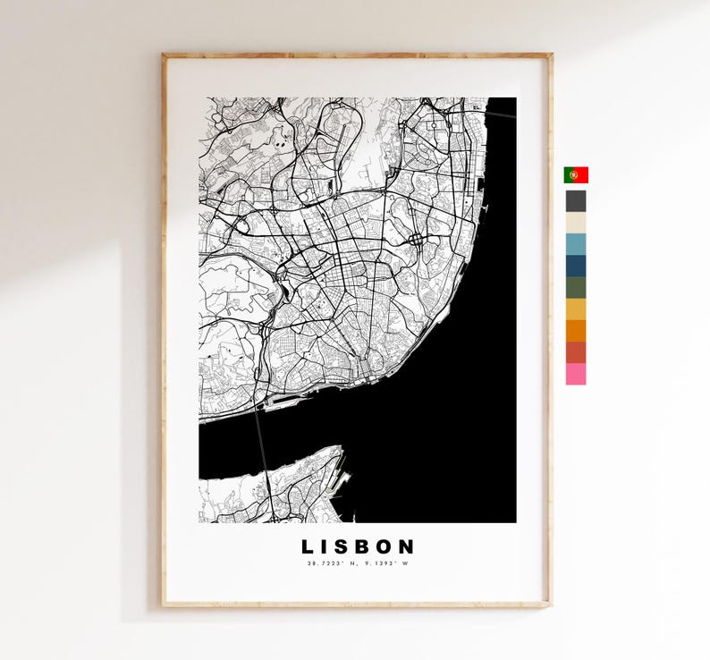 May include: Black and white map print of Lisbon, Portugal with the city name and coordinates at the bottom. The map shows the city's streets and the Tagus River.