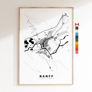 May include: A black and white map of Banff, Canada, with the city name and coordinates printed at the bottom. The map shows the layout of the town with roads, rivers, and other geographical features.