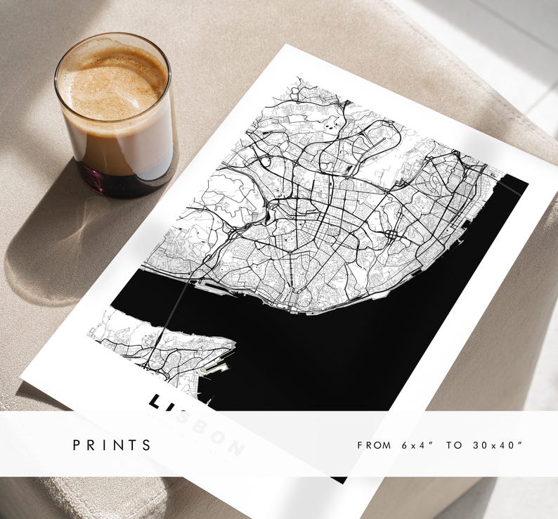May include: A black and white map print of Lisbon, Portugal. The map shows the city's streets and waterways. The print is available in sizes from 6x4 inches to 30x40 inches.