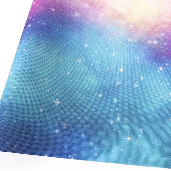 May include: A blue and purple galaxy print fabric with white stars. The fabric has a soft, textured feel.