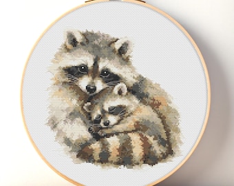Schema per punto croce PDF "Mamma e cucciolo di procione" - Decorazione per la cameretta a tema animali