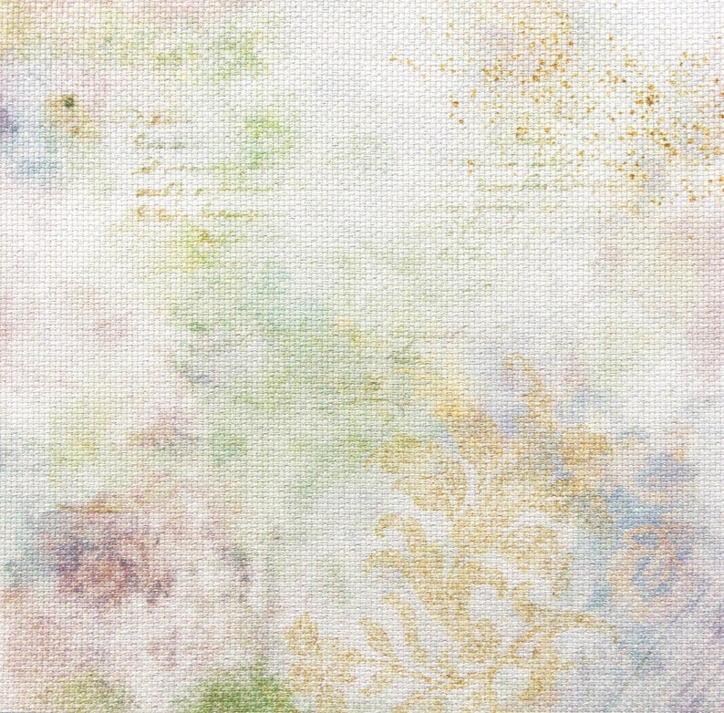 May include: A white canvas background with a subtle texture. The canvas has a faded, watercolor-like design in shades of green, yellow, and purple. The design is abstract and resembles flowers or leaves.