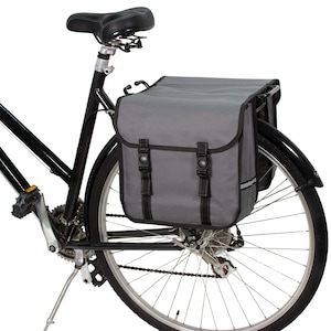 May include: A black bicycle with a grey and black pannier bag attached to the rear rack. The pannier bag has two large compartments and two adjustable straps.