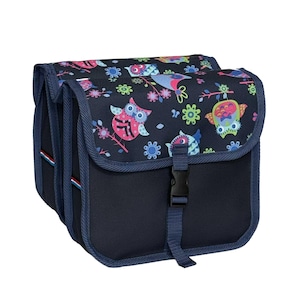 May include: A dark blue double bicycle pannier bag featuring a colourful pattern of owls and flowers on the top flaps. The bag includes adjustable straps with black plastic buckles for secure closure and reinforced blue fabric trim along the edges.