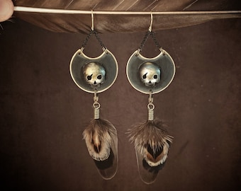 Skull earrings in brass and natural feathers, black and bronze pirate jewelry