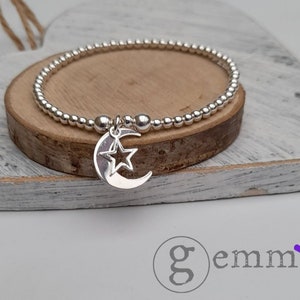 Sterling Silver Stretch Beaded Stacking Bracelet with Crescent Moon & Star charms