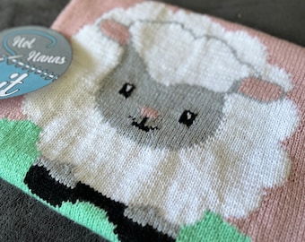 Modello di coperta per neonato a forma di agnello, con schema e istruzioni complete scritte