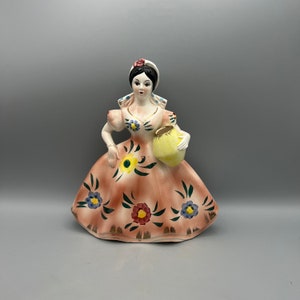 Lady in Pink Floral Dress holding Yellow Water Jug Toothpick or Match Holder, Vintage