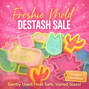 May include: A collection of colorful, gently used Freshie molds in various shapes, including a jar, a cat, and a cactus. The molds are heat safe and come in varied sizes. The image has text that says "Freshie Mold DESTASH SALE" and "Limited Quantities".