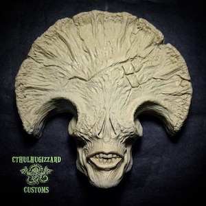 Angel of Death Skull 1/3rd scale relief unpainted resin casting. One of my 31 Heads of Halloween sculpting challenge 2021 Heads