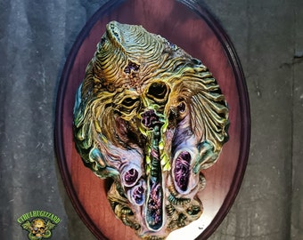 Fossil of a Pre Adamite 1/3rd scale resin relief Hand  painted mounted on a custom stained wood plaque.