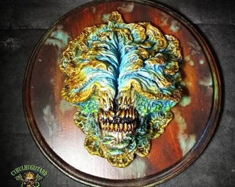 Clicker Bloater Skull Wall plaque 1/3rd scale Hand painted resin casting mounted on stained wood plaque Aqua Blue Yellow Color variant