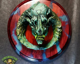Wendigo Skull resin relief Wall plaque 1/4 scale Hand painted resin casting mounted on stained wood plaque , blue green bone color version