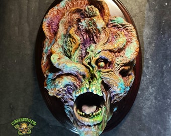 The Clicker Carnivorous Fungus  version 2 Hand Painted 1/3rd scale resin relief mounted on a stained wood Wall Plaque.