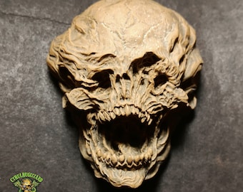 Neomorph skull 1/3rd scale relief unpainted resin casting.