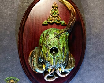 Champion of Nurgle Helmet 1/6th scale hand painted resin relief mounted on a stained wood wall plaque .