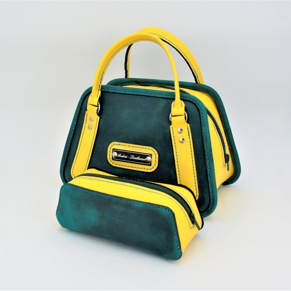 Handmade exclusive leather handbag, bag in bag - made of fine pullup cowhide in petrol and yellow. Saddle stitch - hand sewn.