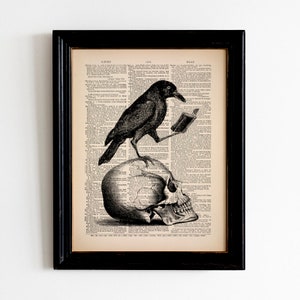 May include: A black crow perched on a human skull, reading a book. The image is printed on a vintage dictionary page.
