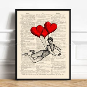 May include: A black and white illustration of a woman flying with three red heart-shaped balloons. The woman is wearing a swimsuit and is holding onto the balloons with her hands. The illustration is printed on a vintage dictionary page.