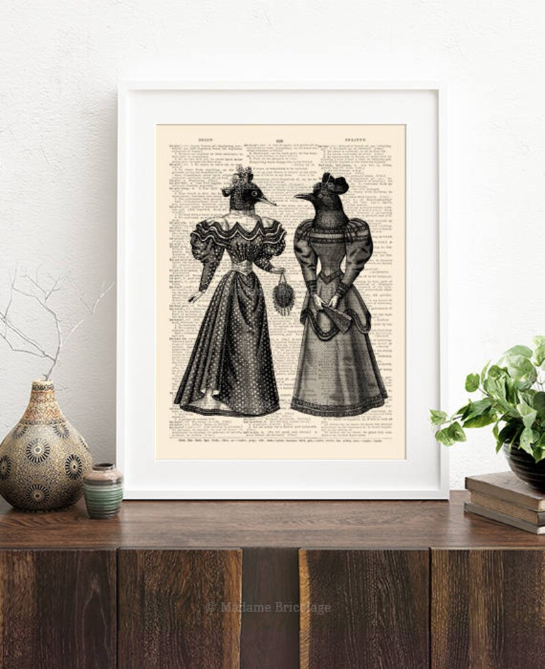 May include: Black and white illustration of two women wearing Victorian-era dresses with bird heads. The image is printed on a vintage book page with text.