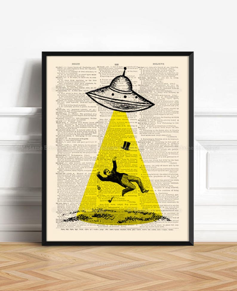 May include: A black and white illustration of a flying saucer beaming a yellow light down on a man in a top hat and suit. The image is superimposed on a page of a vintage dictionary.