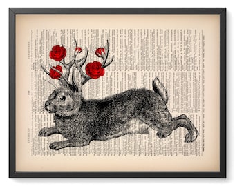 May include: A black and white illustration of a rabbit with red roses growing from its antlers. The image is printed on a vintage book page with text.