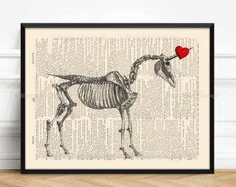 May include: A black and white illustration of a unicorn skeleton with a red heart on its horn. The illustration is printed on a vintage book page.