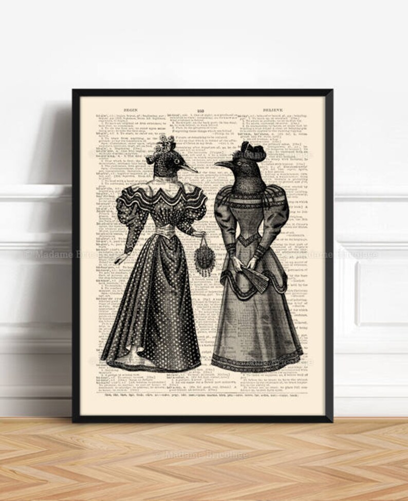 May include: Two women in Victorian-era dresses with bird heads. The women are standing side-by-side, and the image is printed on a page of a vintage book.