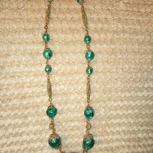 Czech 1930s green foil and filligree brass necklace