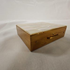 Lovely mid century powder and lipstick compact