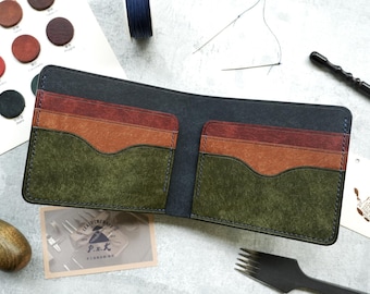 May include: A bifold leather wallet featuring a dark blue exterior and interior with layered card slots in olive green, tan, and burgundy. The wallet is constructed with visible stitching and curved pocket edges, showcasing a multi-colored design.