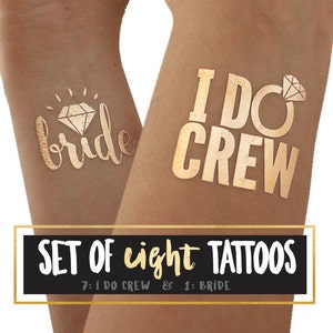 May include: Set of eight gold temporary tattoos, seven with the text "I DO CREW" and a diamond ring, and one with the text "bride" and a diamond.