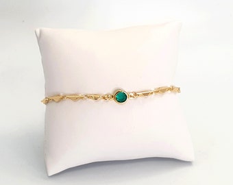 Bracelet doré à l'or fin, pierre couleur vert émeraude