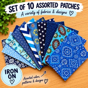 May include: A set of 10 assorted iron-on patches featuring a variety of blue fabrics and designs. The collection includes patterns such as floral prints, white chevrons, yellow flowers, white stars, and paisley motifs, all arranged in a fan shape.