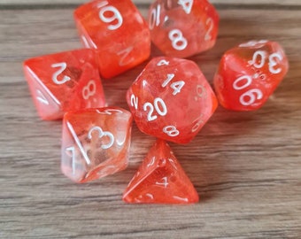 Orange and clear dice