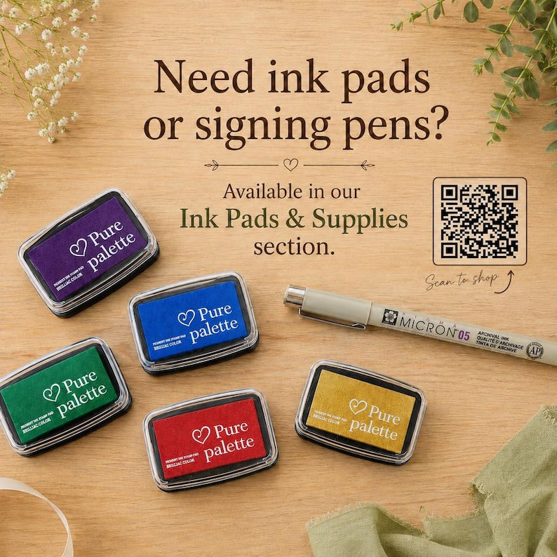 May include: Five rectangular ink pads in purple, blue, green, red, and yellow, each labeled Pure Palette with a heart icon, alongside a grey Micron 05 pen. Text reads: Need ink pads or signing pens? Available in our Ink Pads & Supplies section.