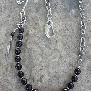 Hosenkette aus Onyx und Stahl