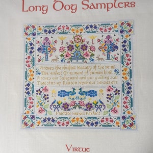 May include: A white cross-stitch sampler with a colorful floral design and the text "Virtue's the chiefest Beauty of the mind. The noblest Ornament of human kind. Virtue's our Safeguard and our guiding star That stirs up Reason when our Senses ert. Practice makes Perfect."