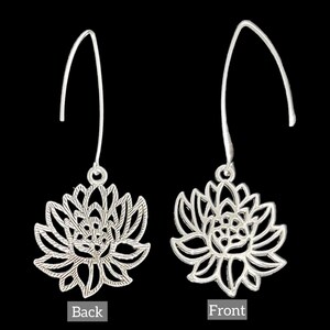 May include: A pair of silver dangle earrings with a delicate lotus flower design. The earrings are shown from the front and back.