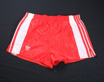 Red and white store running shorts
