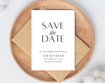 May include: Save the date card with a white background and black text. The text reads "Save the Date" for the wedding celebration of Tim & Sarah, September 21, 2025, invitation to follow.