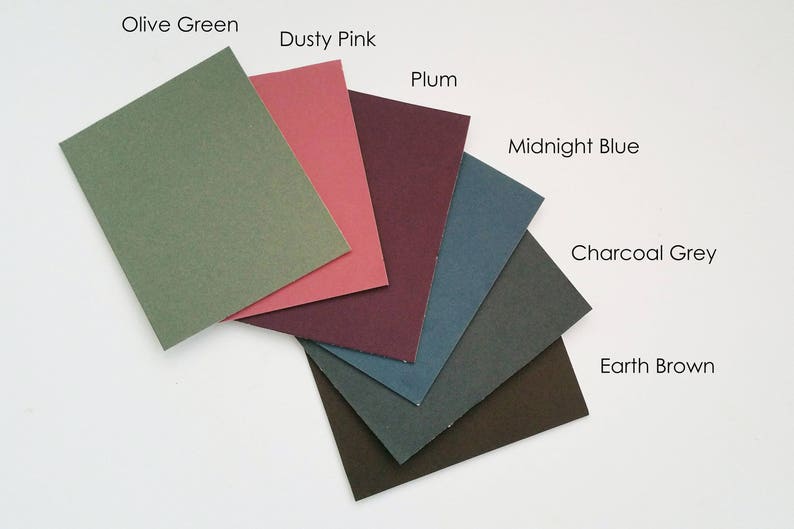 May include: A collection of six color swatches in shades of olive green, dusty pink, plum, midnight blue, charcoal grey, and earth brown.