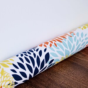 Blooms Maya Door Draft Stopper. Colors  White, Orange, Gray , Yellow and Navy. Choose Your Length ( 28”L up to 42”L) *****UNFILLED