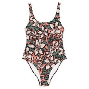 Trending Tropical Women&#39;s One-Piece Swimsuit, Beautiful Tropical floral pattern, Flattering one-piece with Exotic Print, Perfect for Summer.